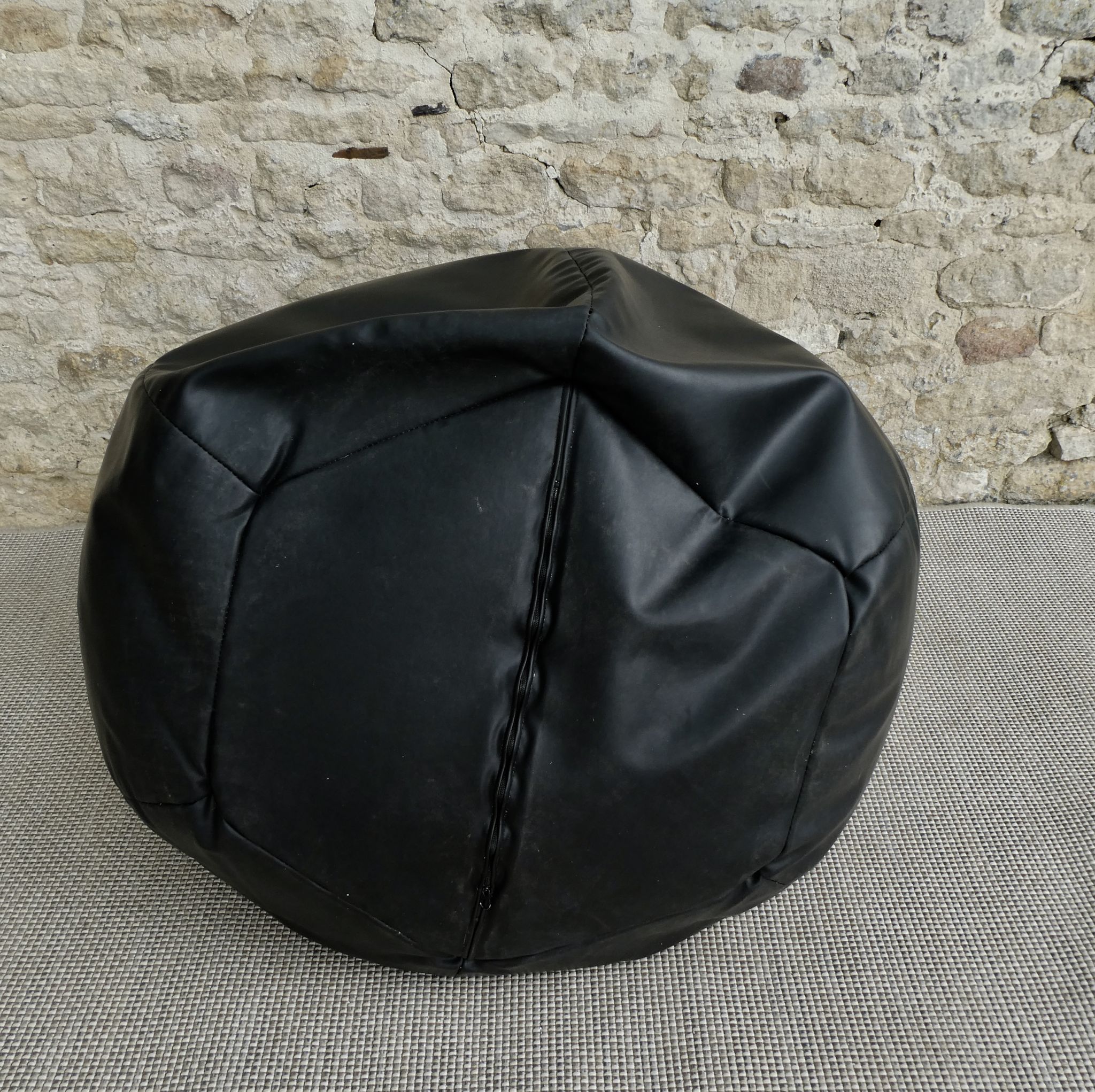 Pear armchair in imitation black leather