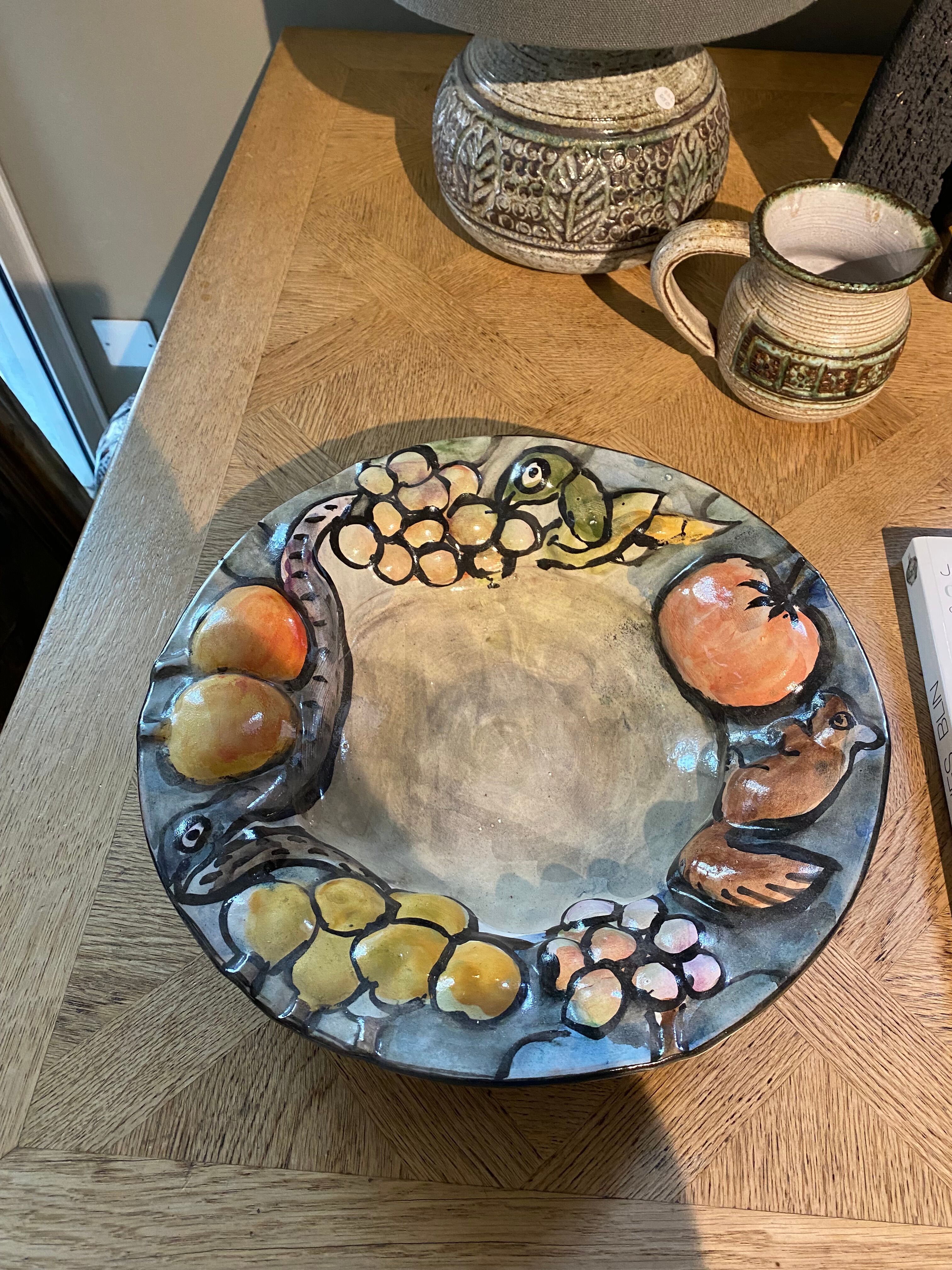 Plate snake contemporary artist