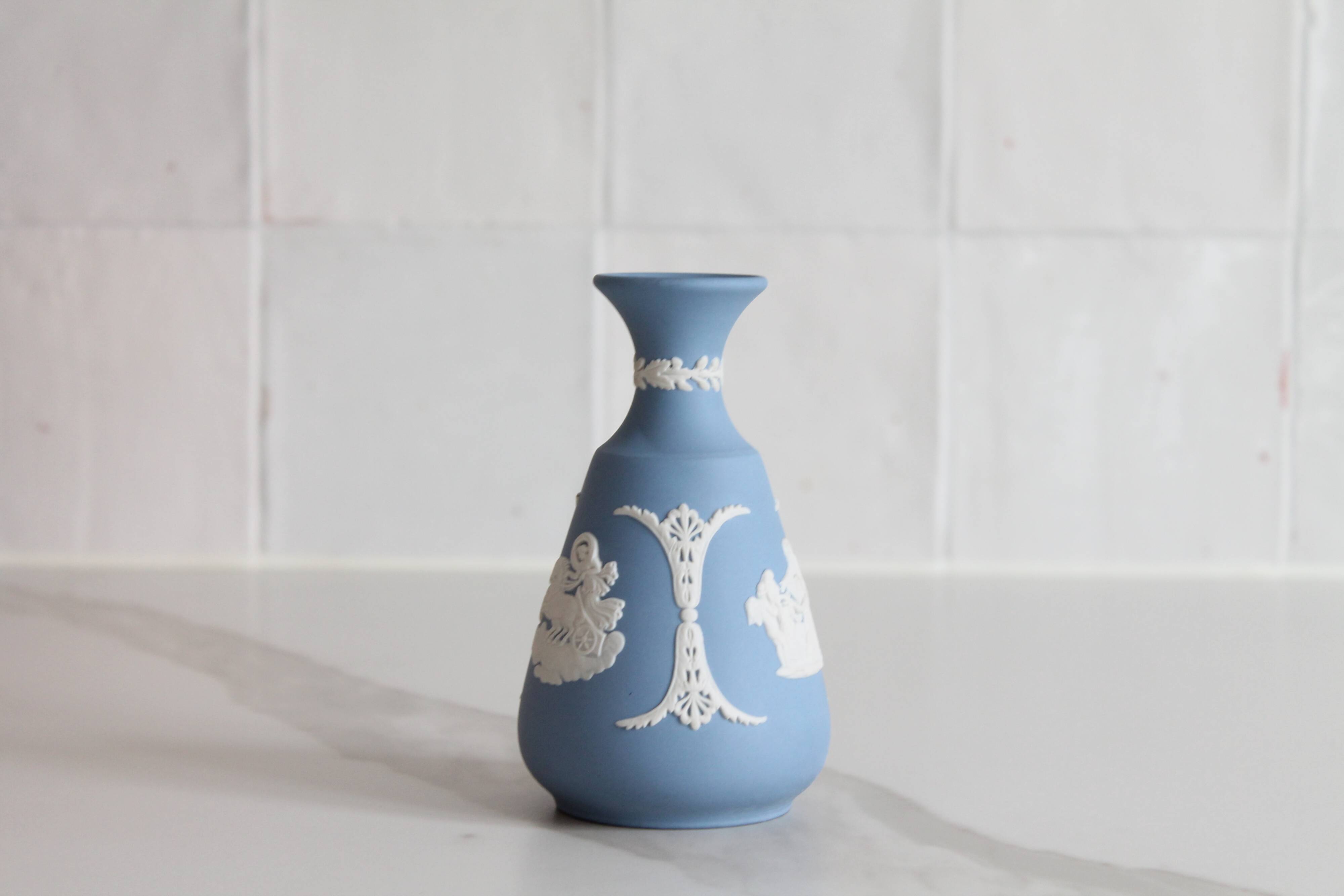 Blue porcelain vase by Wedgwood.