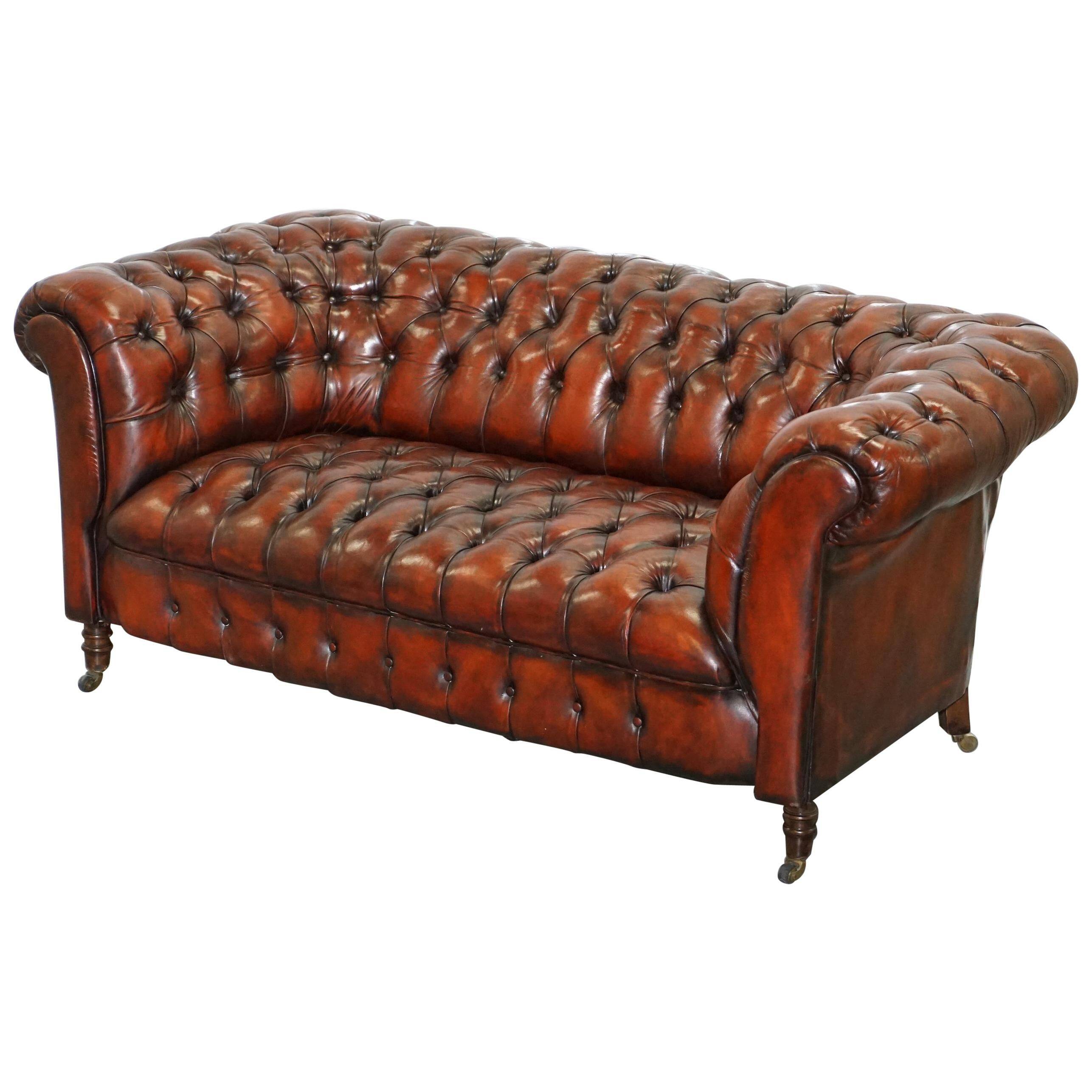 Small Victorian leather Chesterfield sofa