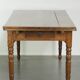 Antique oak dining table from the late 18th century with extendable leaves