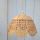 Openwork rattan suspension
