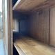 Large row of solid oak loom sliding doors