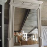 Antique bevelled mirror, frame in pearl grey patinated wood.
