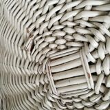 Braided rattan armchair