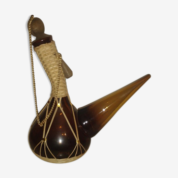 glass and wicker beak bottle