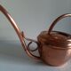 Vintage copper watering can
