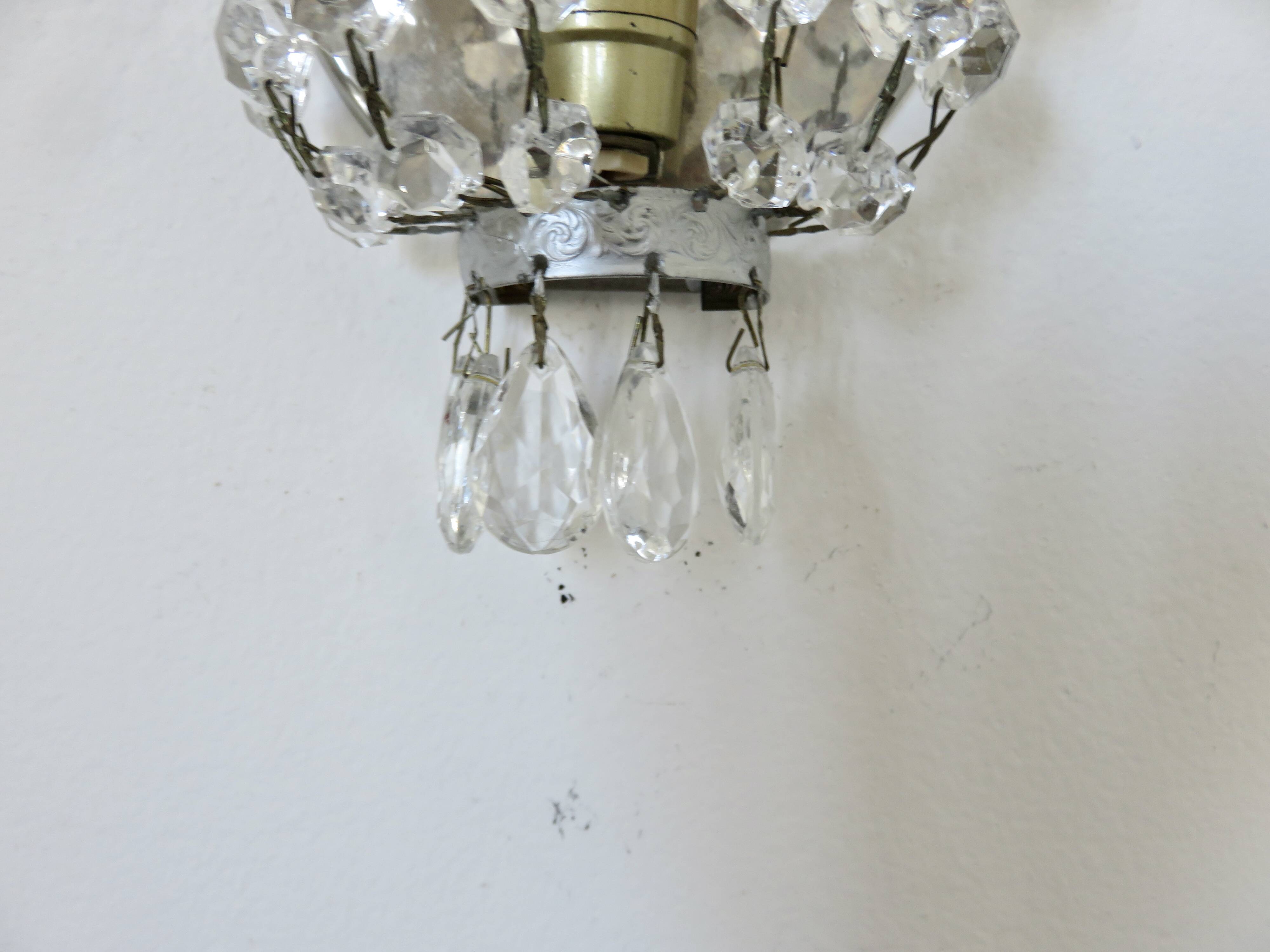 Pair of silver-plated balloon wall lights with pendants, circa 1970.