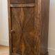 Antique bedside table in wood and grey marble, old brown.