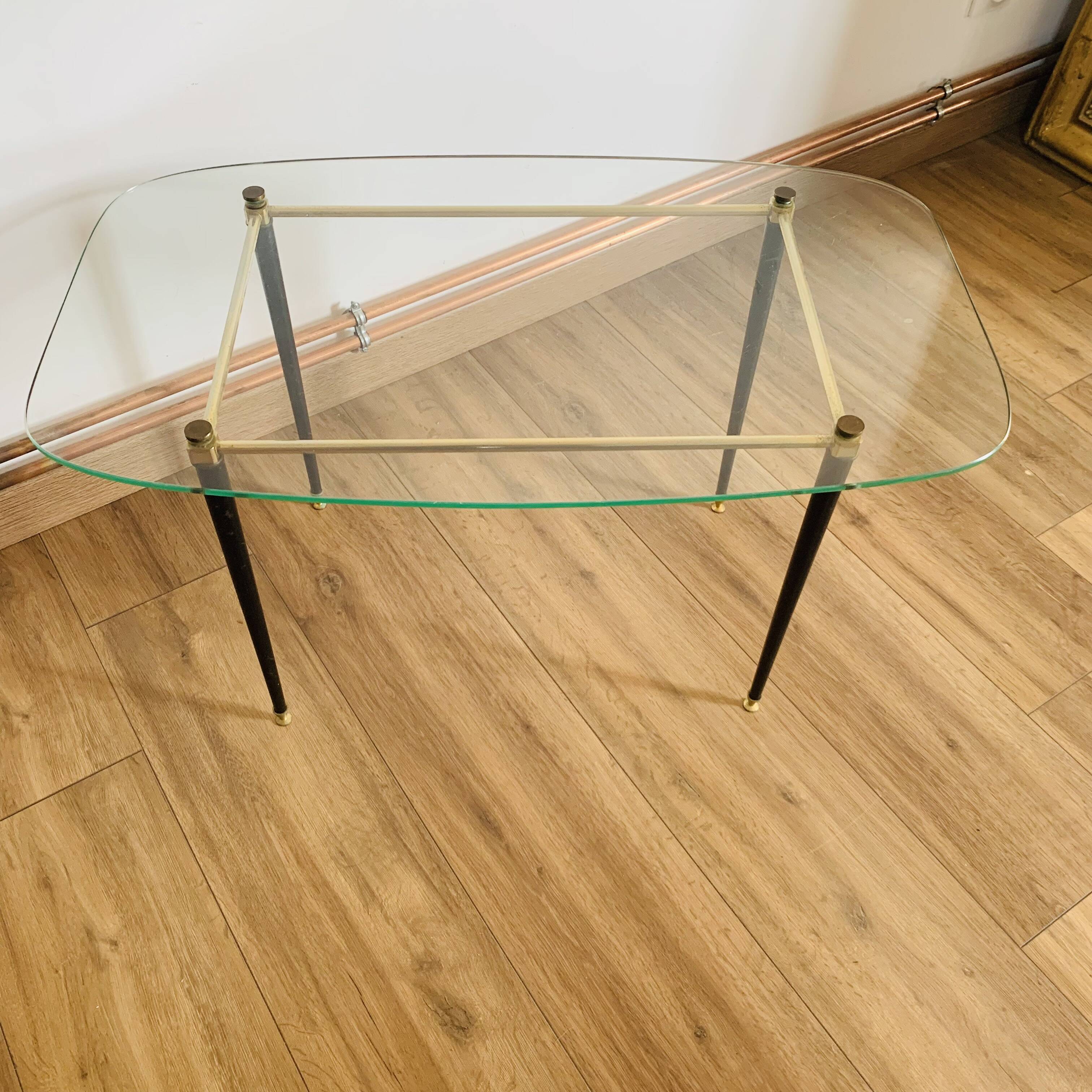 Coffee table from the 50s/60s, glass, brass, black metal.