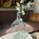 Transparent glass bottle