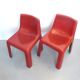 Pair of red fibreglass chairs from the 1970s.