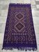 Hand-woven purple margoum rug in natural wool