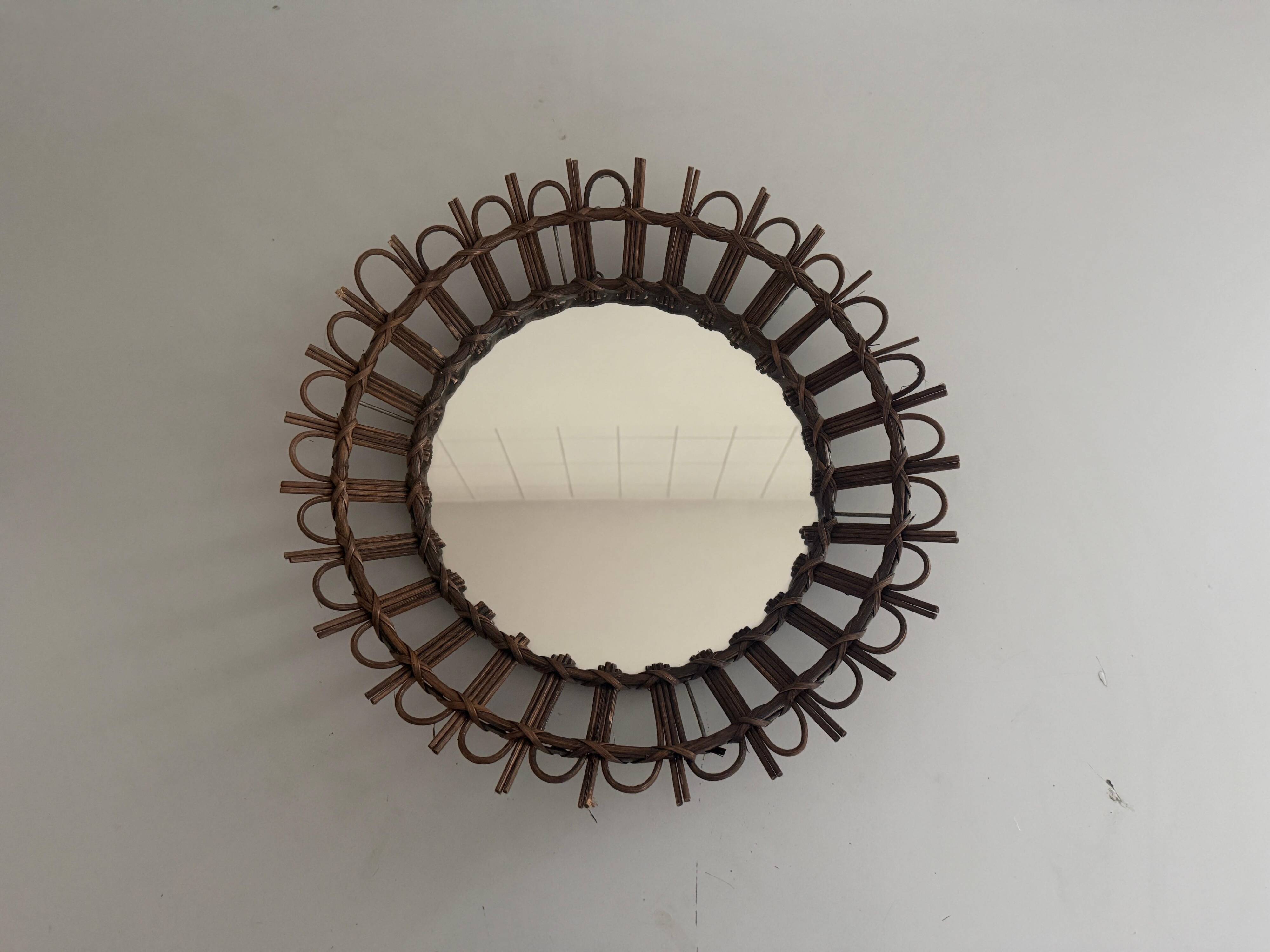 Round wall mirror with a modern mid-century wooden frame, 1960s, Germany.