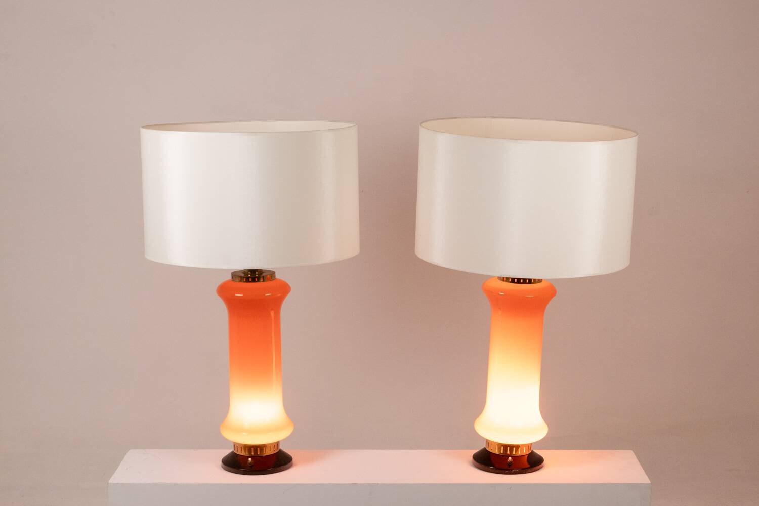 Pair of orange glass lamps. 1970s.
