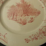 Assiette plate en faience de Pexonne décor champetre.