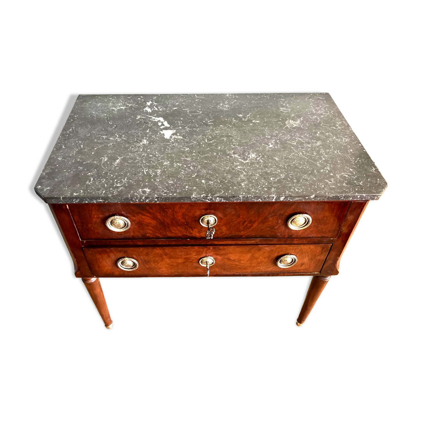 Louis XVI style wooden veneered chest of drawers with a marble top.