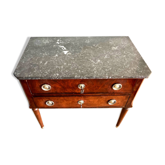 Louis XVI style wooden veneered chest of drawers with a marble top.
