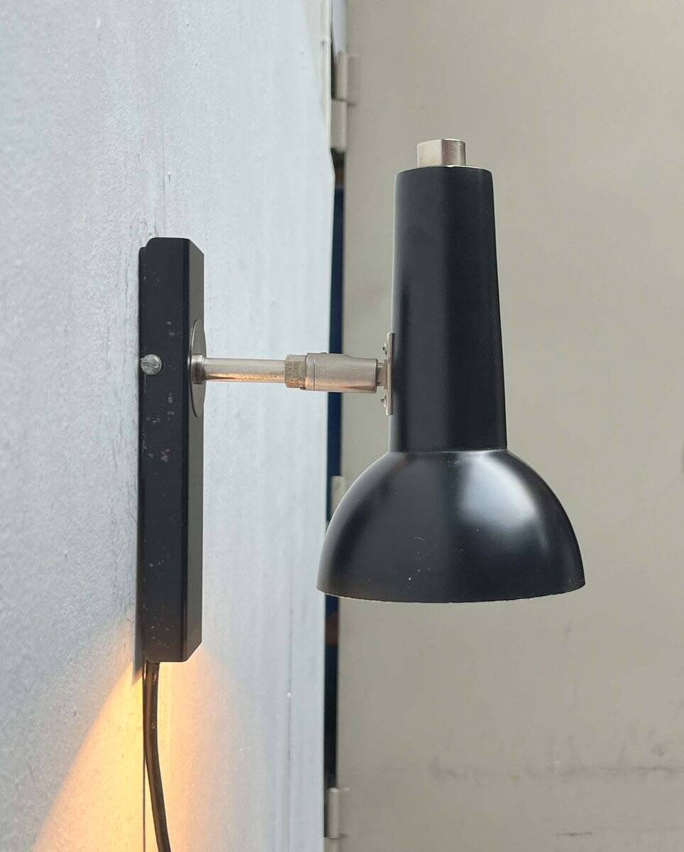 Mid-century German black minimalist wall lamp by Hustadt, 1960s.