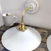 Set of two electrified white opaline wall lamps to nine