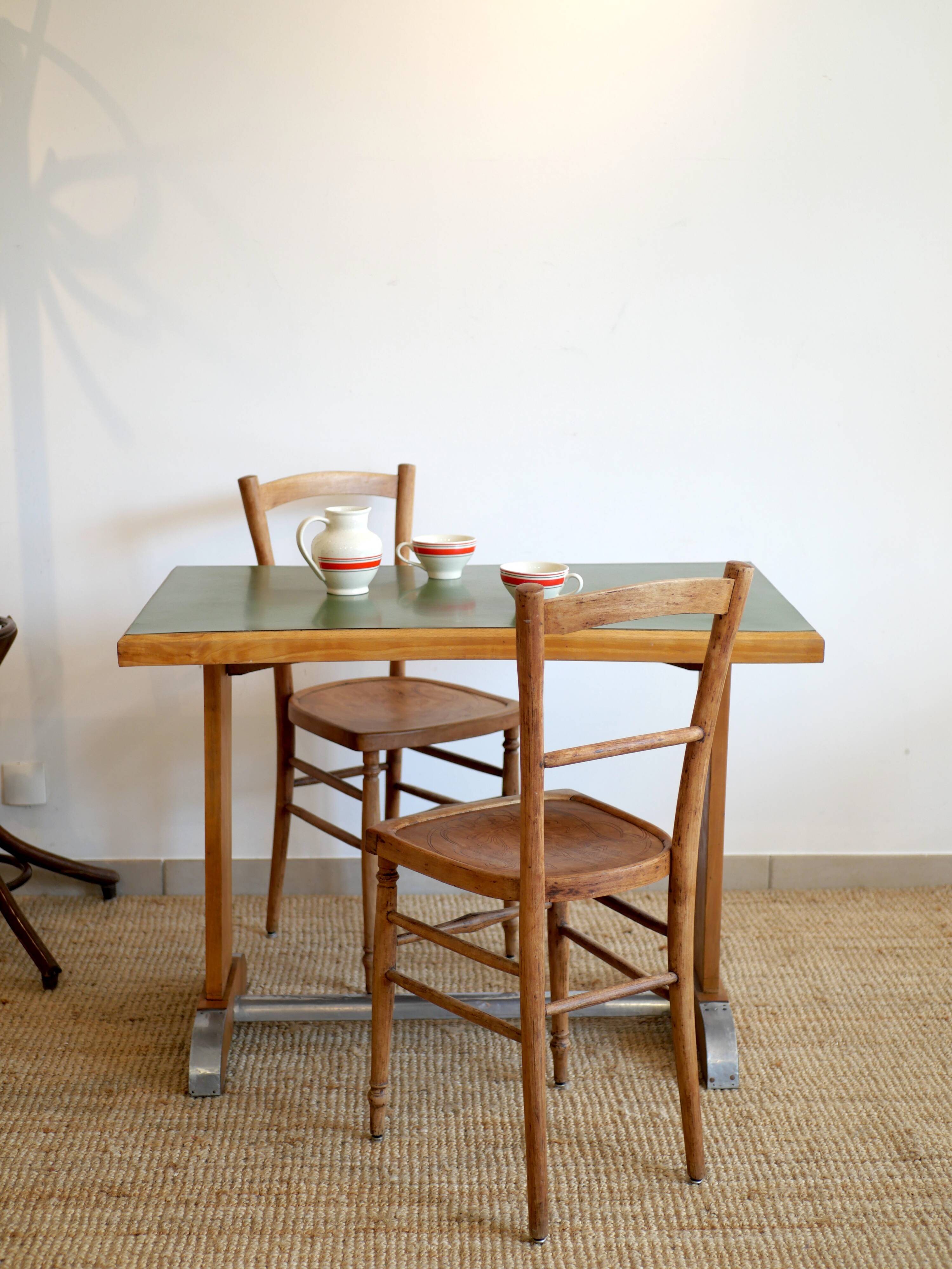 Bistro table and its two 1950s chairs