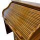 Vintage American wooden desk with a roll-top.