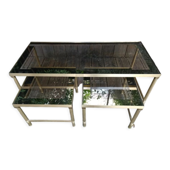 Nesting tables in brass and smoked glass 1970