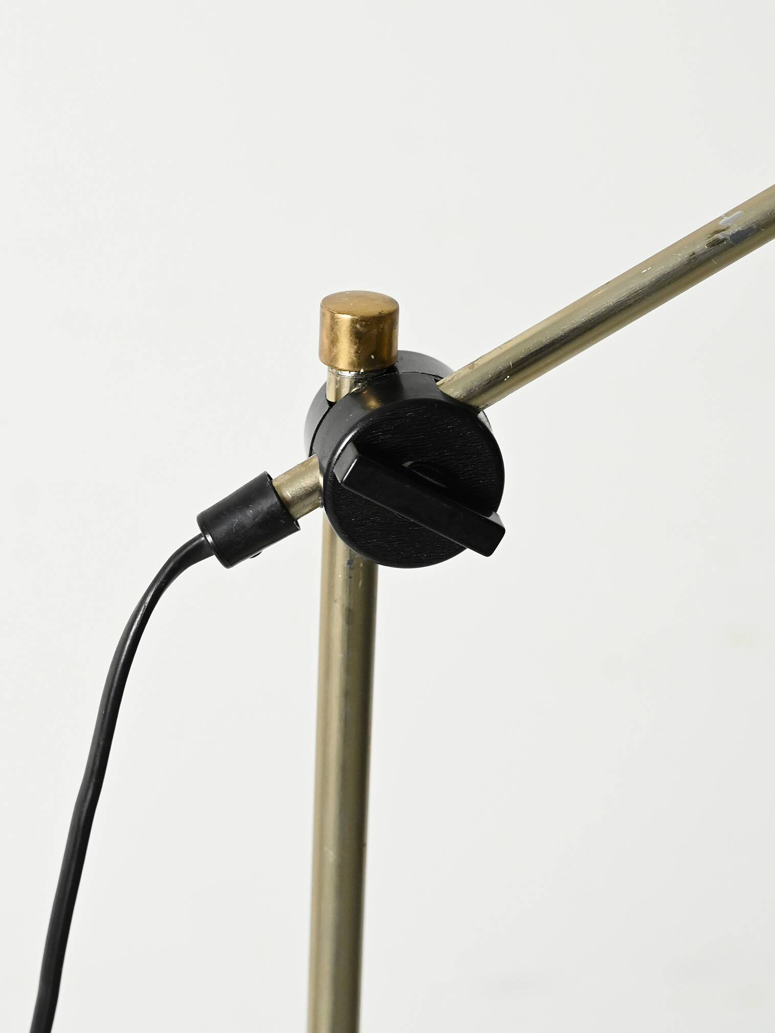 Brass floor lamp with green leather
