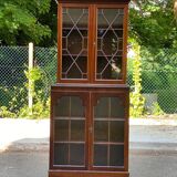 English display case with 2 wooden bodies