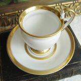Tasse et soucoupe ancienne en porcelaine blanche et or XIXème avec poignée forme tête de cygne