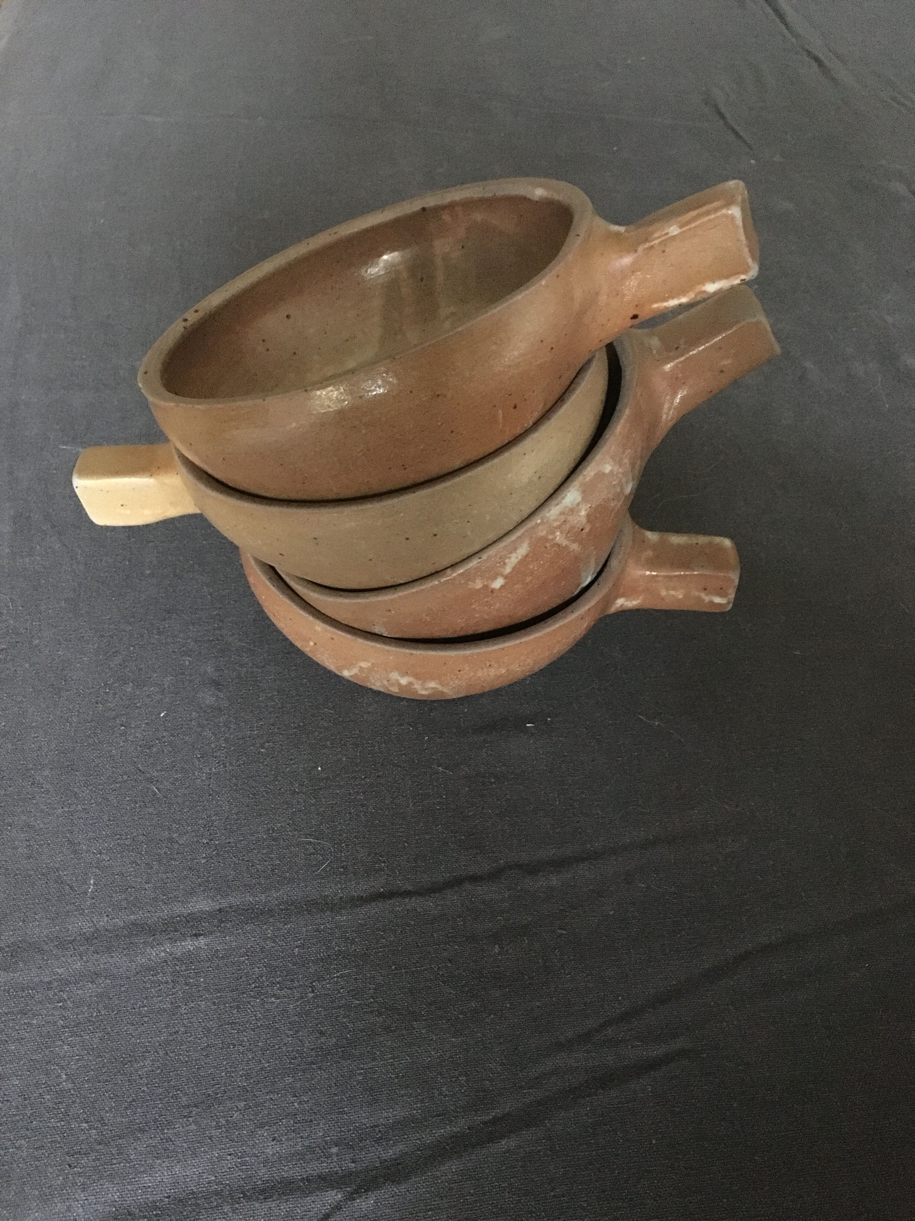 4 enamelled sandstone bowls