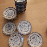 Service of 12 bowls and 12 under dishes in Chinese porcelain called rice seed of the 1960s