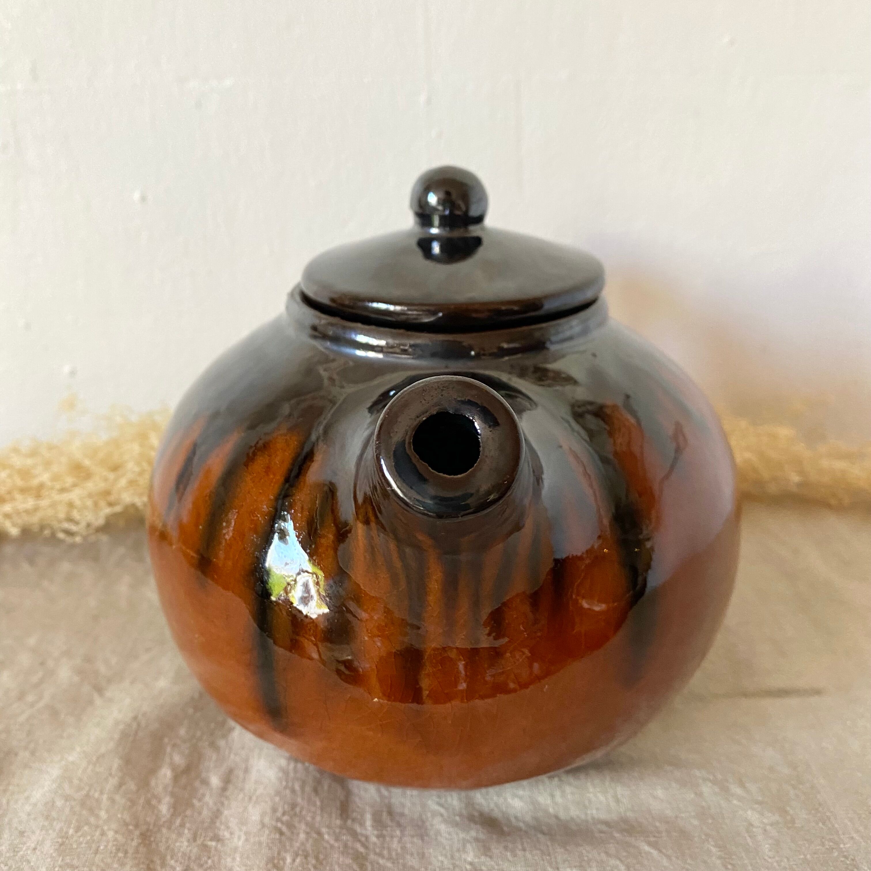 Glazed terracotta teapot