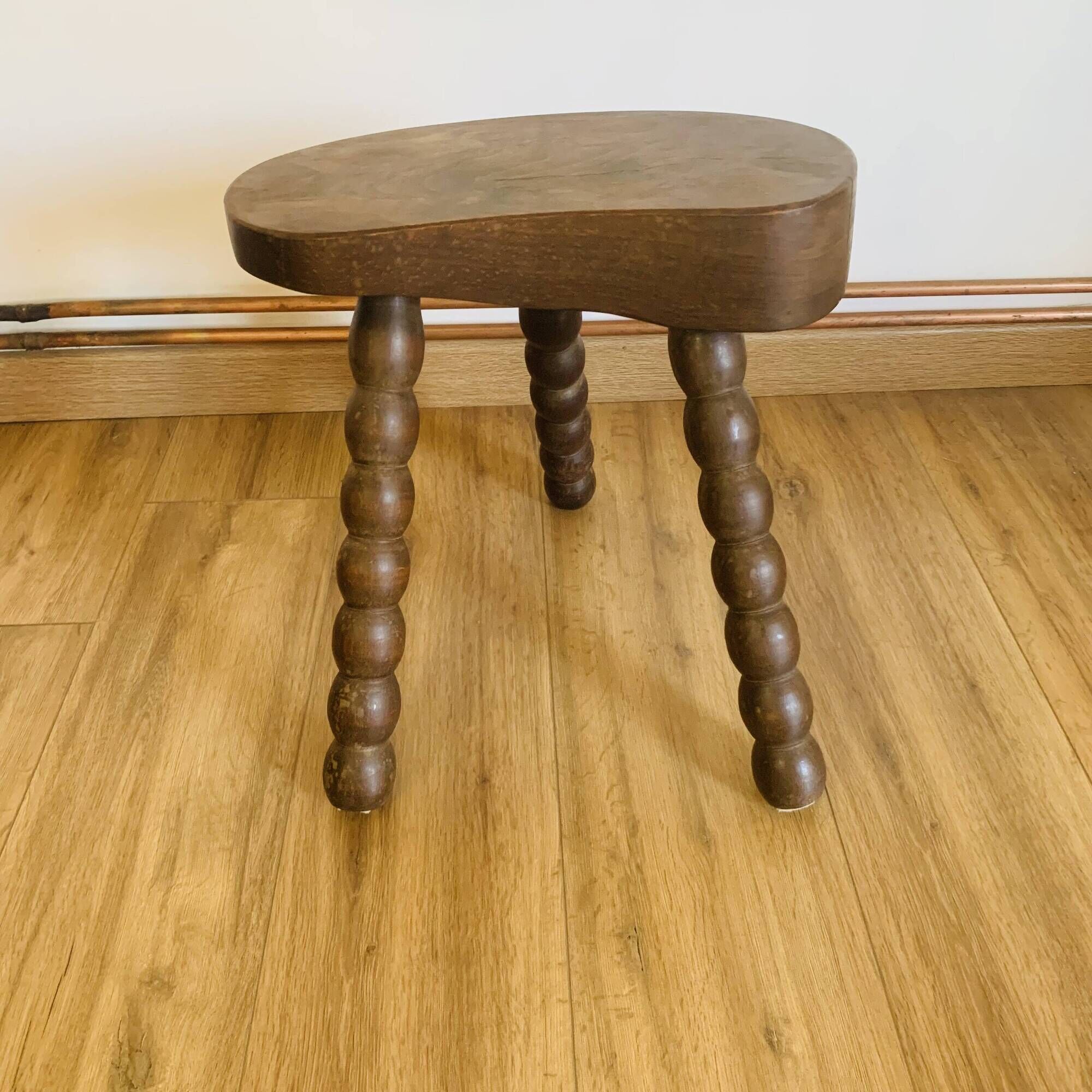 Tabouret vintage à pieds bobines