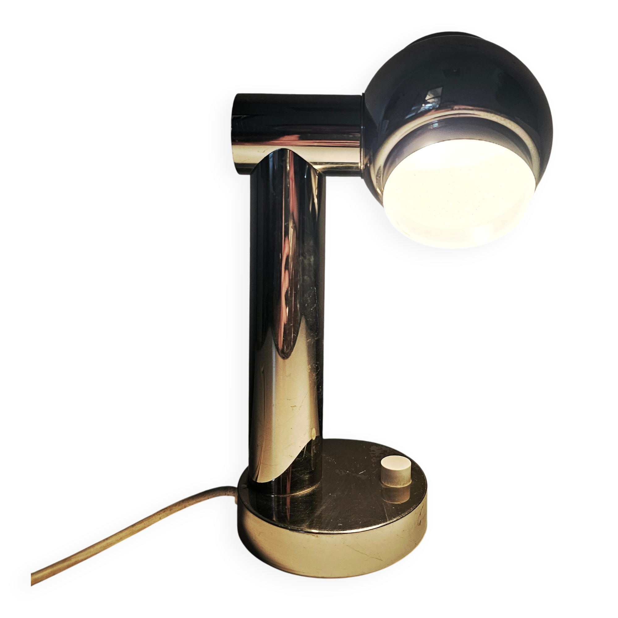 Space Age table lamp in chrome with a swivelling shade, Italy 1970s.