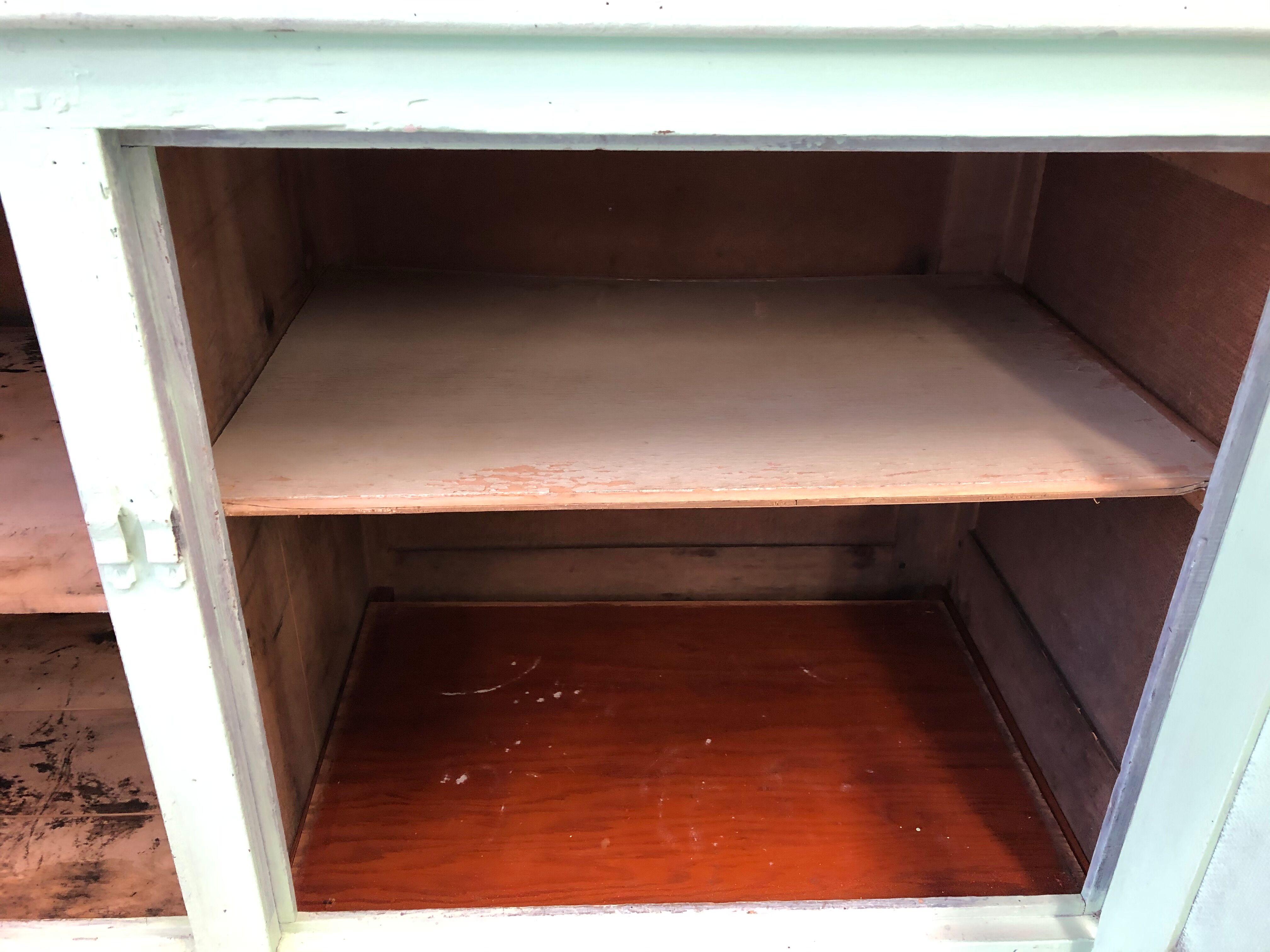 Low green patinated furniture