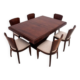 Original walnut extendable table, designed by Louis Majorelle, with 6 Art Deco chairs.