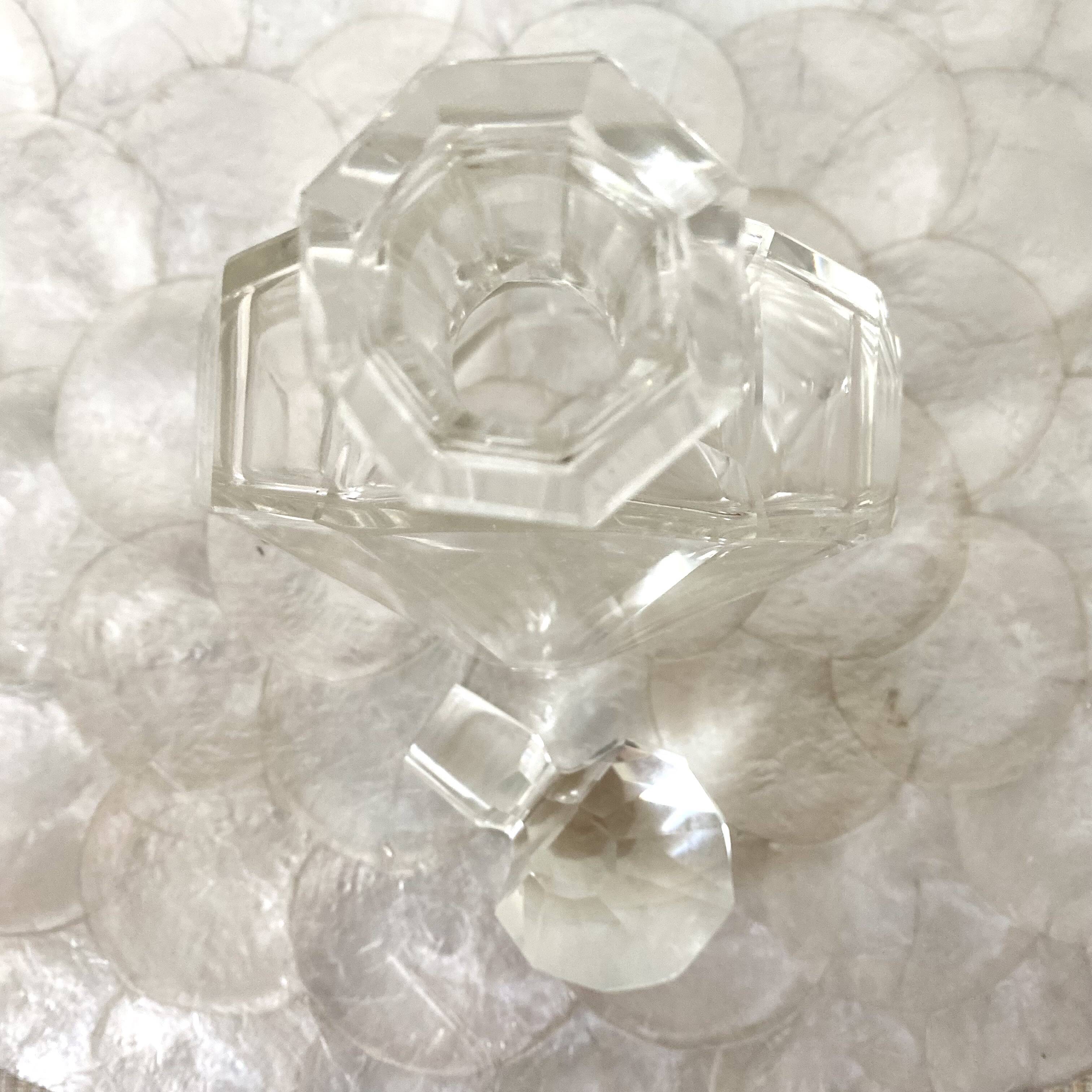 Stylized shell-shaped carafe