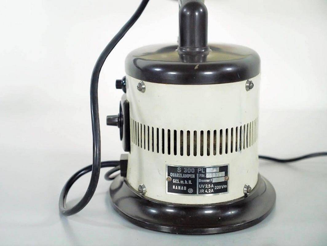 Black and white table lamp made from a 1940s solar lamp.