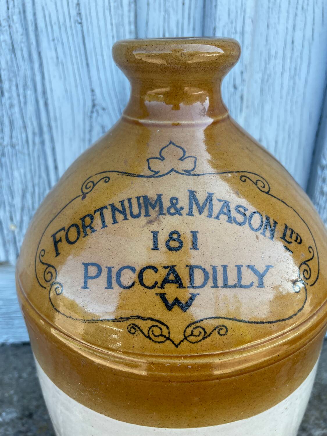 Old English stoneware jar or jug with a glazed finish.