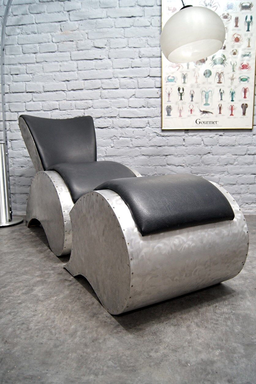 Industrial aluminum & vinyl lounge chair with footrest, 1970s