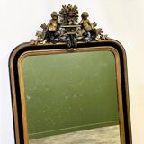 Antique 1800s black and gold mirror with cupid, France 1800s.
