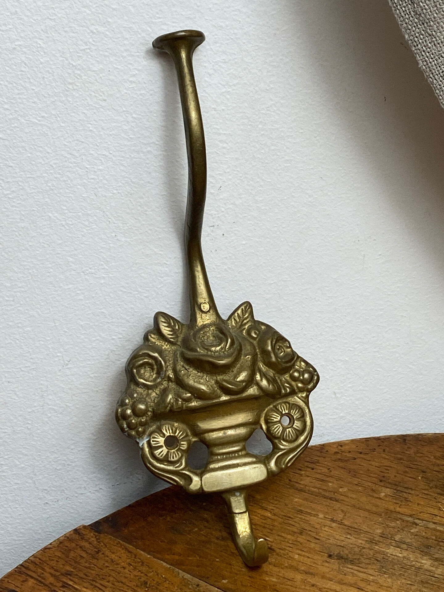 Wall-mounted brass hook