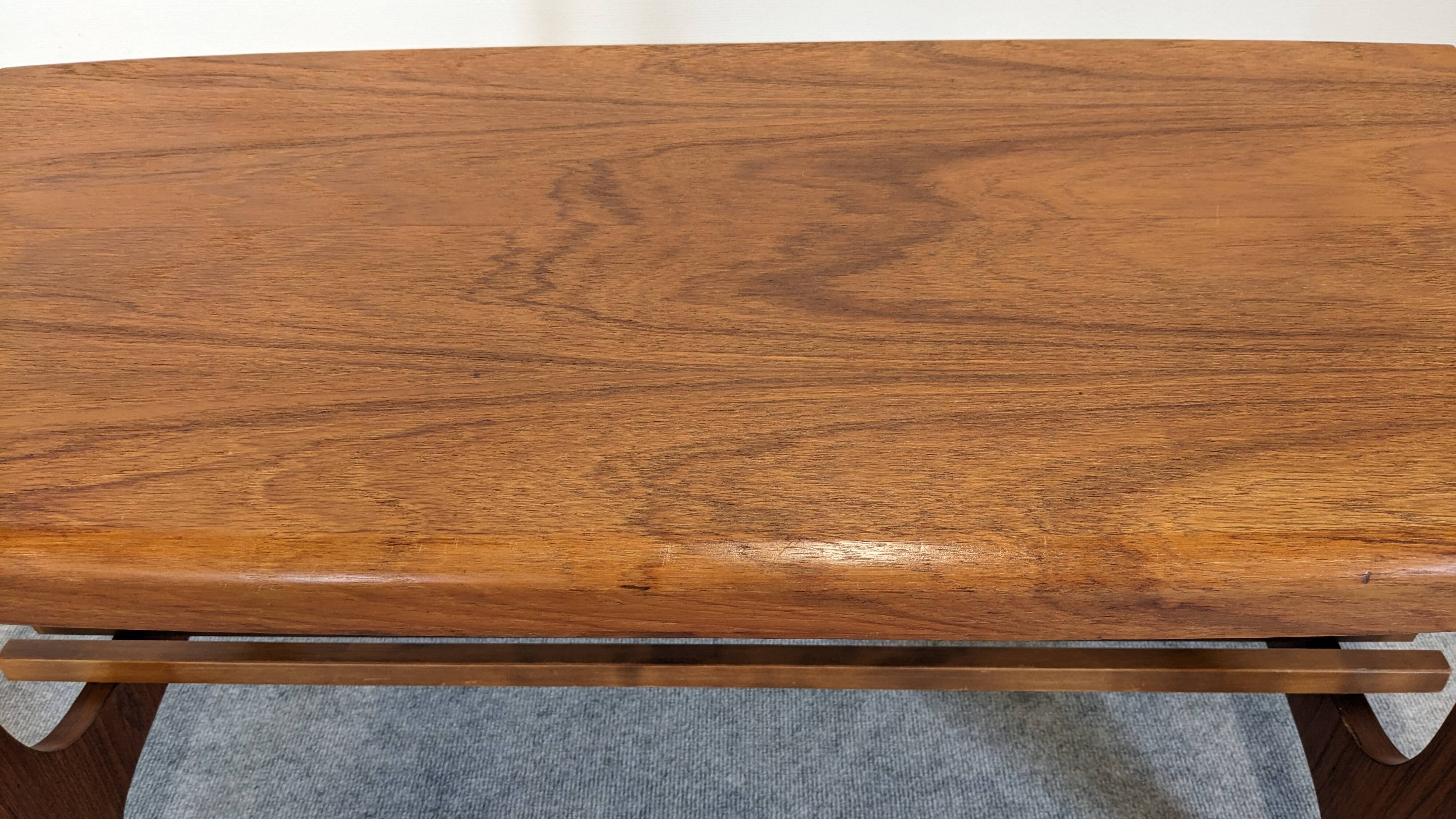 Scandinavian teak coffee table with magazine rack, Sweden circa 1970.