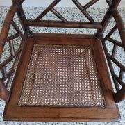 Asian canine armchair in wood in imitation of bamboo