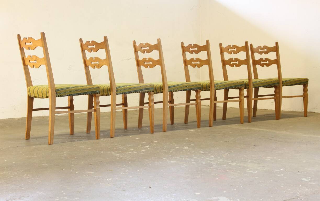 Vintage 1960s brutalist Danish modern oak dining chairs in the style of Henning Kjærnulf