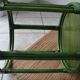 Green rattan side table.