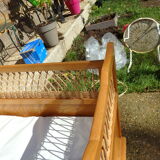 Vintage baby bed in rattan