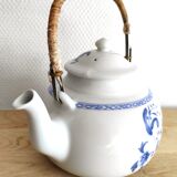 Teapot in porcelain of Paris