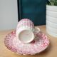 Fine porcelain coffee cup and saucer